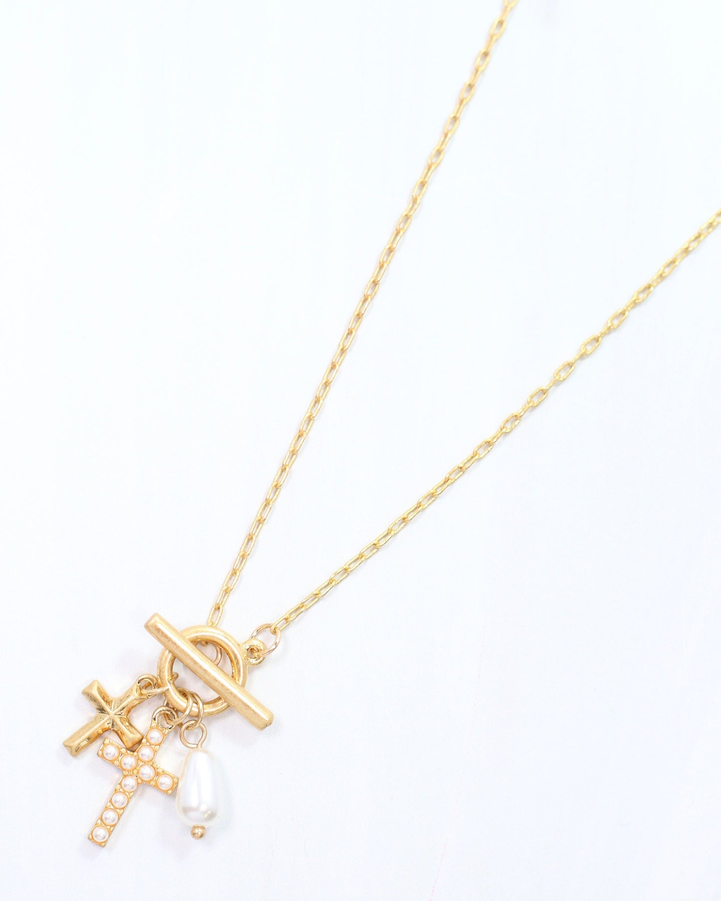 Parton Cross Charm Necklace Worn Gold