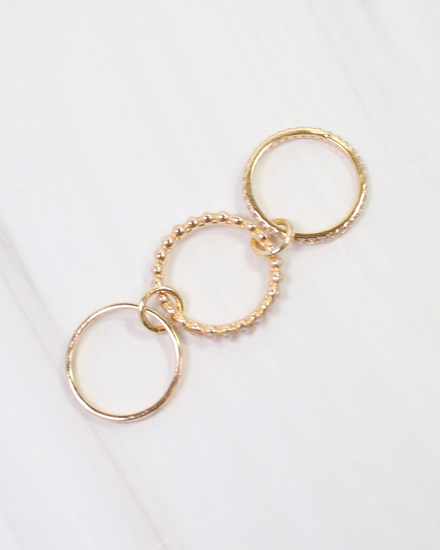 Caldwell Interlocking CZ Ring WR Gold