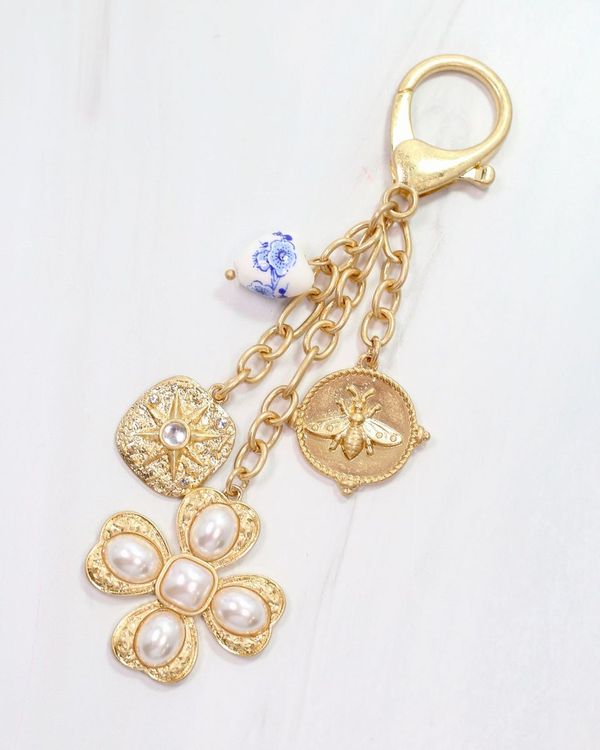 Verona Gold and Pearl Bag Charm Worn Gold