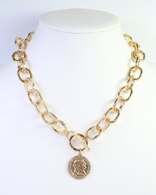 Aubree Hammered Coin Toggle Necklace Worn Gold