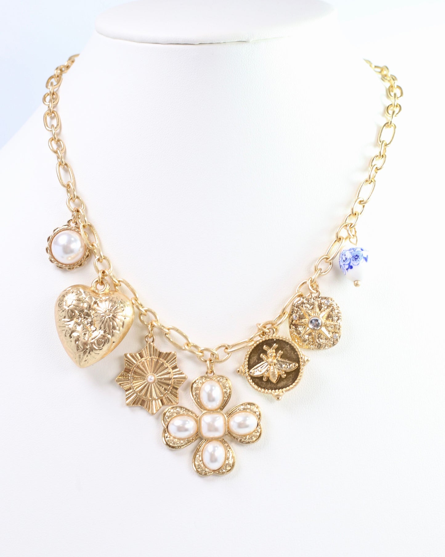 Verona Gold and Pearl Charm Necklace Worn Gold