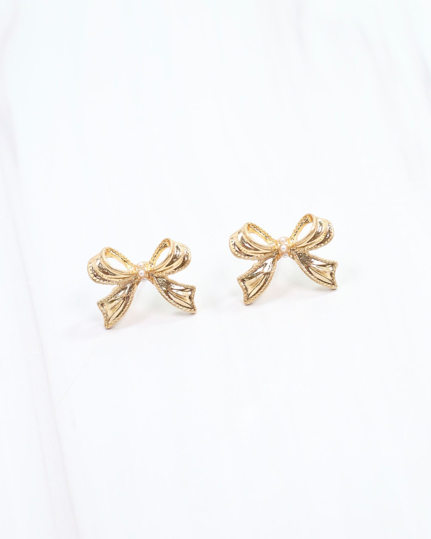 Emmie Bow Stud Worn Gold