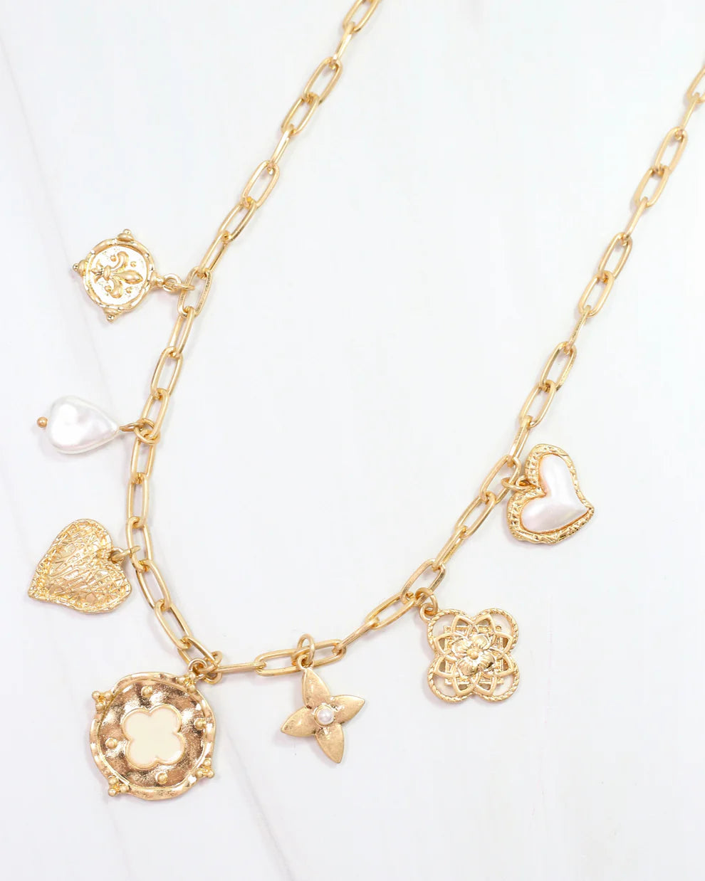 Nolen Charm Necklace Worn Gold