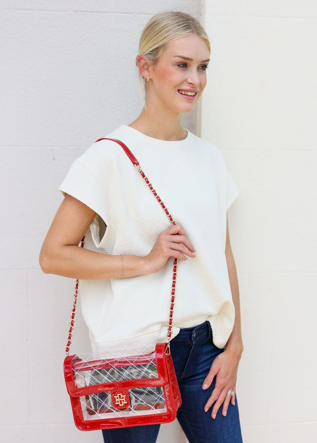 http://shopcarolinehill.com/cdn/shop/products/quinn-quilted-clear-red-patent-carolinehill-174899.jpg?v=1692304875&width=1024