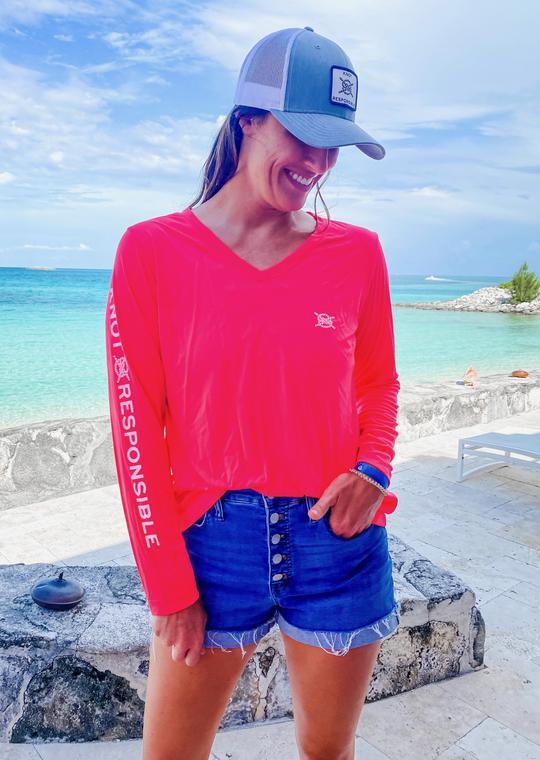 pink long sleeve v neck shirt
