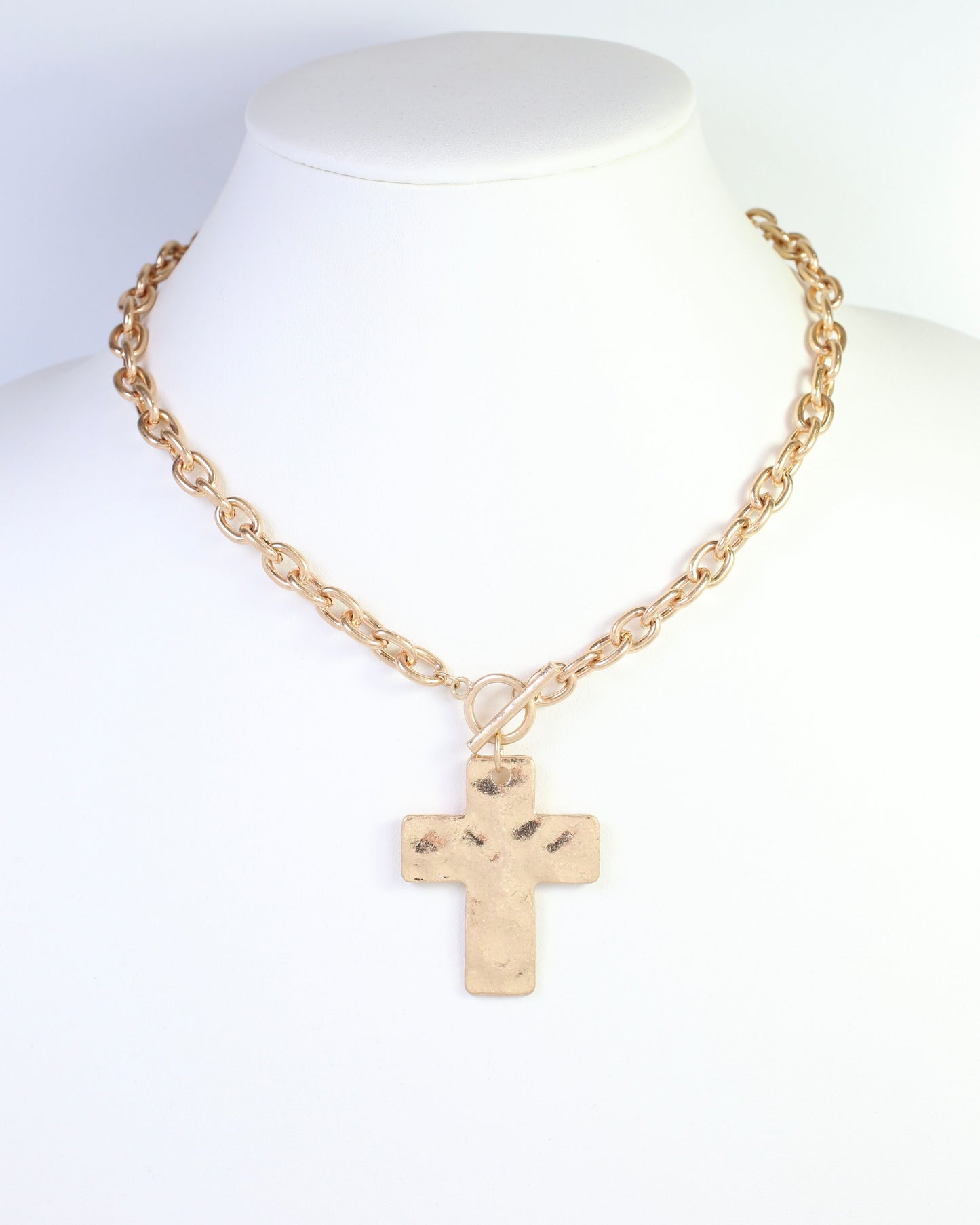 Celeste Hammered Cross Toggle Necklace Worn Gold