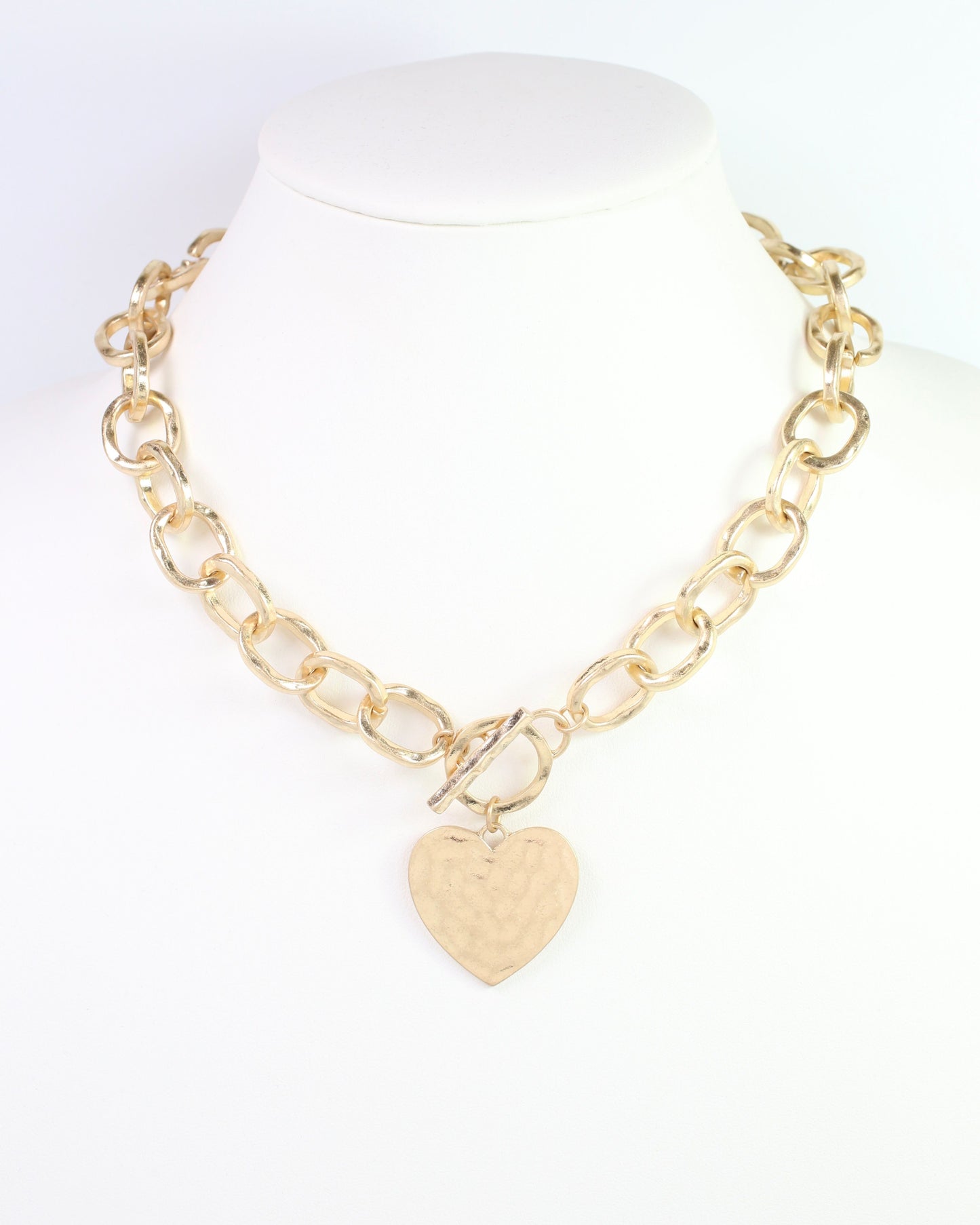 Emi Hammered Heart Charm Toggle Necklace Worn Gold