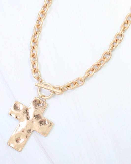 Celeste Hammered Cross Toggle Necklace Worn Gold