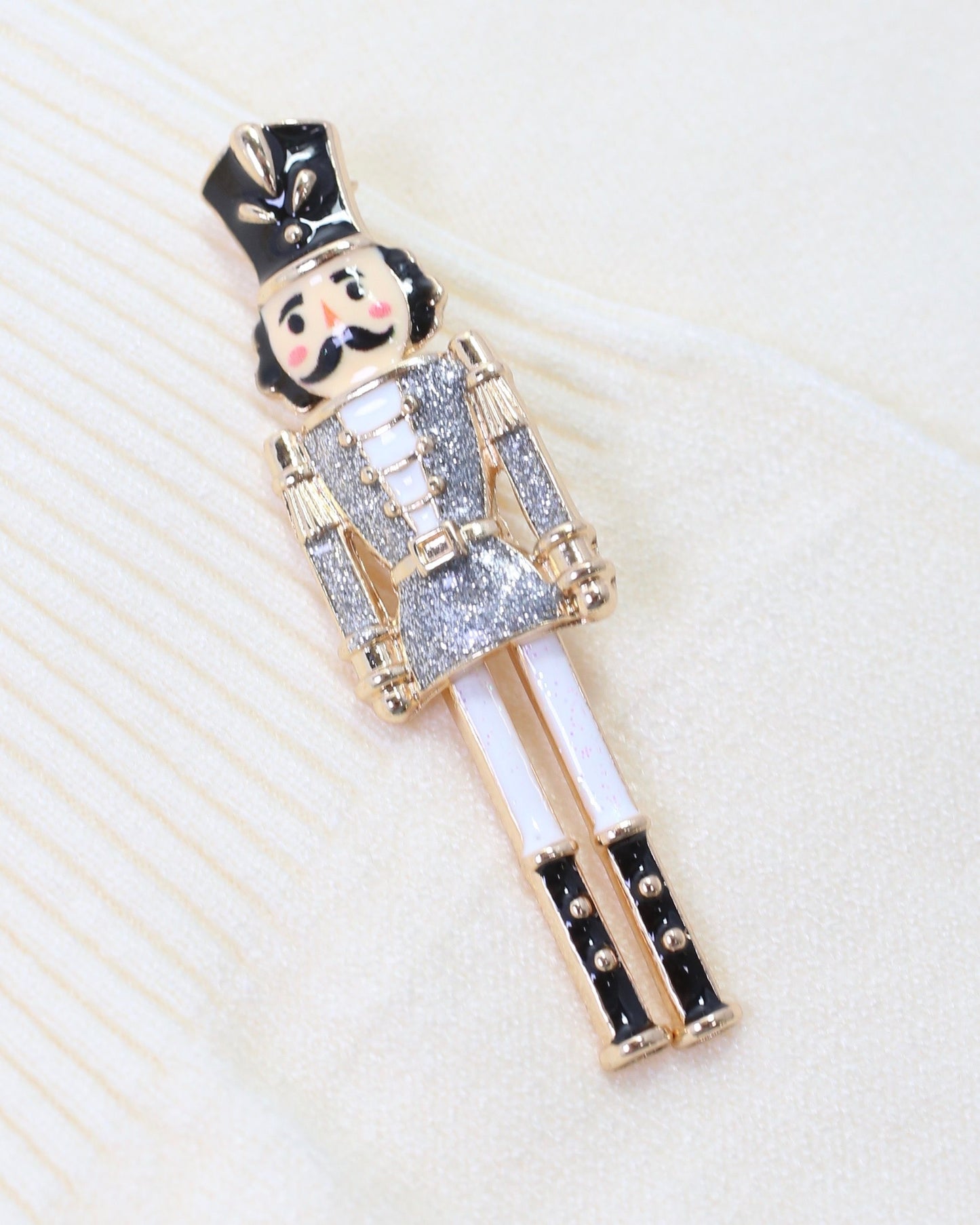 Naughty or Nice Nutcracker Brooch Silver