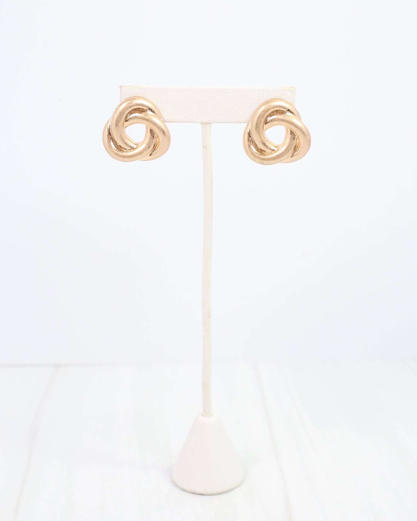 Osprey Open Knot Earring Worn Gold