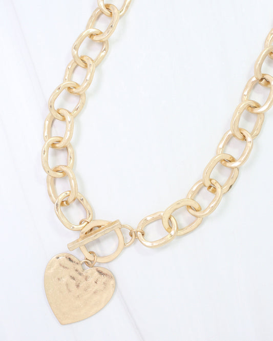 Emi Hammered Heart Charm Toggle Necklace Worn Gold